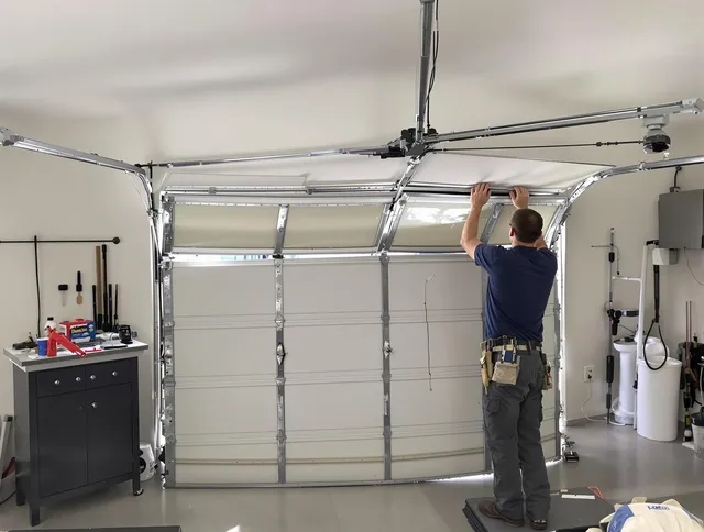 Tustin Garage Door Repair specialist performing precise section replacement on Tustin garage door