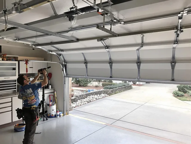 Garage door track repair service by Tustin Garage Door Repair in Tustin